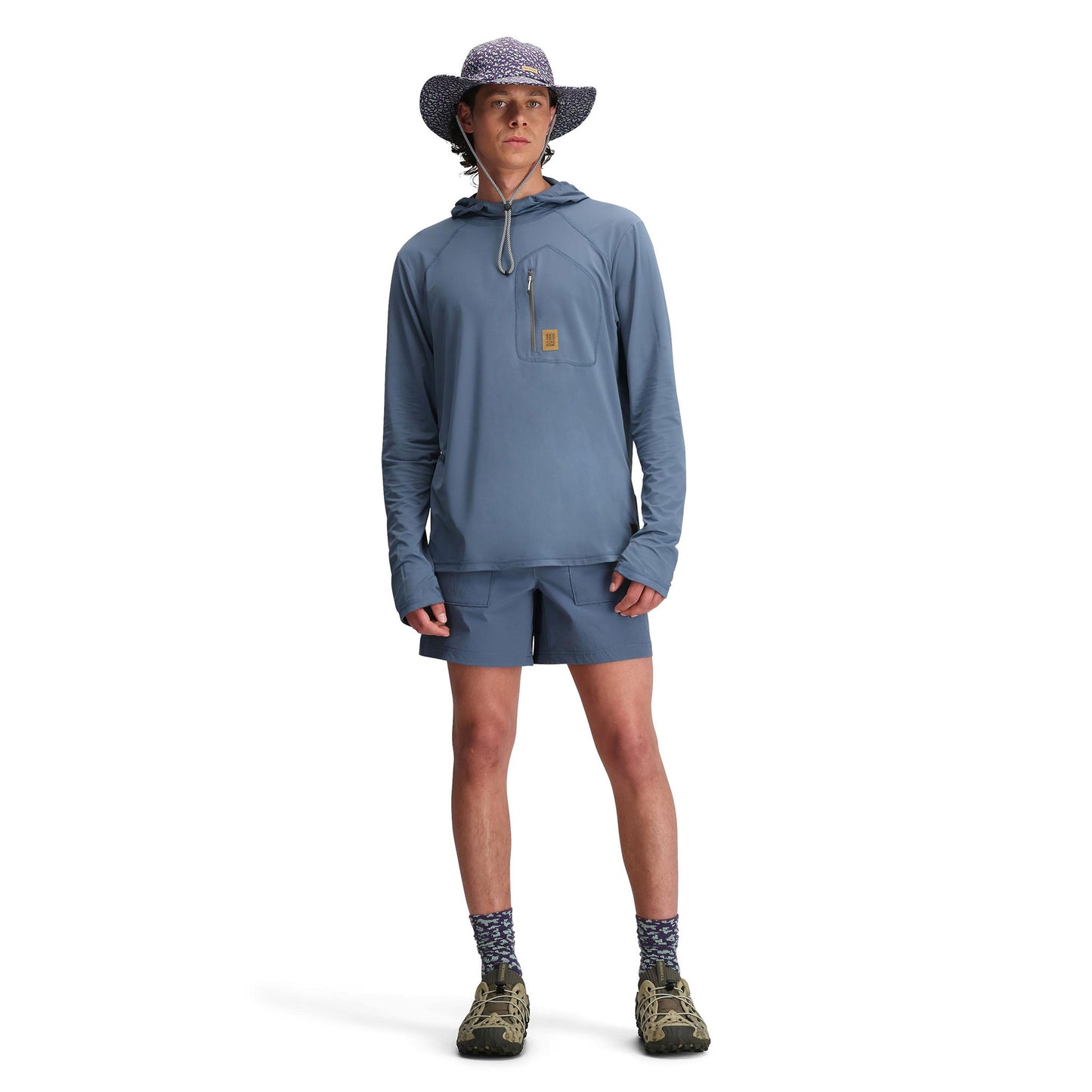 General front model shot of Topo Designs Sun Hoodie - Men's in "Stone Blue"
